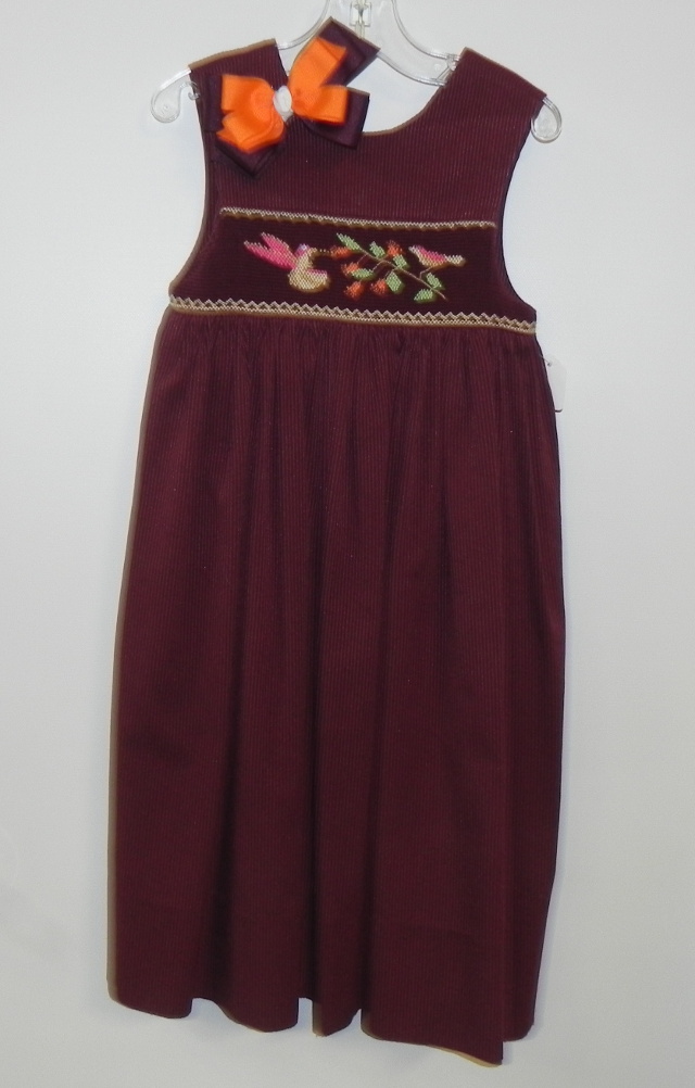 Rosalina size 5Y plum sleeveless blend dress with smocked bird motif. Matching bow not included. Our Price $28